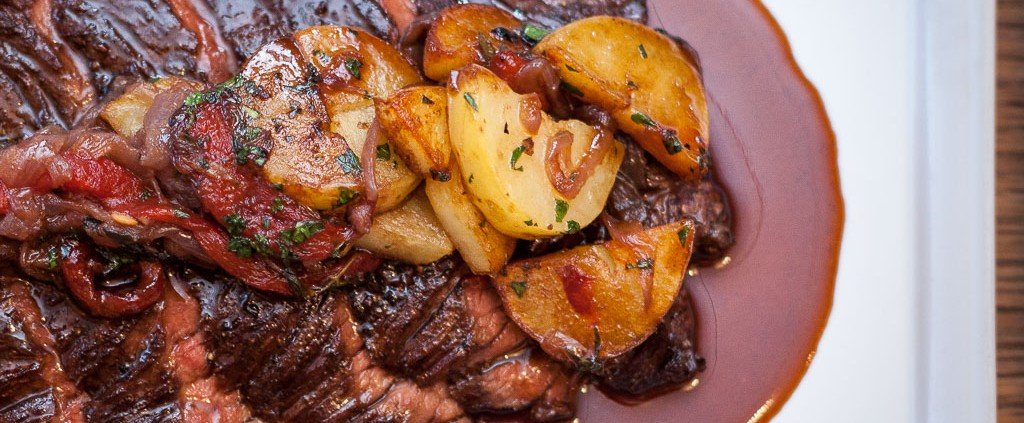 Chargrilled onglet with patatas a lo pobre