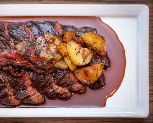 Chargrilled onglet with patatas a lo pobre