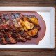 Chargrilled onglet with patatas a lo pobre